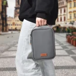 WiWU Minimal Tech Pouch – Ultimate organization for your gadgets, offering sleek storage for cables, chargers, power banks, earphones, and more with a minimalist design and durable, water-resistant fabric.