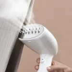 XO-CF3 1500W Handheld Garment Steamer – Powerful & Portable Clothes Steam Iron Iron smarter, faster, and safer with the XO-CF3 1500W Handheld Garment Steamer. Designed to combine powerful steam performance with user-friendly portability, this compact steamer makes wrinkle removal quick and easy at home or on the go. Its high-performance 1500W motor, 330ml water tank, and anti-dry burning safety feature make it a must-have for modern living. Whether you’re prepping for a meeting or freshening up clothes during travel, the XO-CF3’s quick heat-up time, ergonomic design, and powerful steam output allow for efficient fabric care across a wide range of garments. ✨ Key Features 💨 1500W Strong Steam Power Experience deep wrinkle removal and fresh-looking clothes in seconds. With a powerful 1500W motor, this steamer penetrates thick fabrics and smooths out wrinkles with ease. ⚡ Quick Heat-Up Don’t wait around. The XO-CF3 heats up quickly, allowing you to start steaming clothes shortly after powering it on—perfect for last-minute wardrobe touch-ups. 🧺 330ml Water Tank The generously sized 330ml tank allows for longer steaming sessions without frequent refills. Easily steam multiple garments in one go. 🛡️ Anti-Dry Burning Protection Worry less with built-in safety. If the water level runs low, the unit automatically powers off, protecting you and your device from damage. 🧳 Compact & Lightweight At just 847g, this steamer is easy to carry, store, and maneuver. Whether it’s for daily home use or travel, the XO-CF3 won’t weigh you down. 🧼 Brush Attachment Included Comes with a brush connector that helps lift dust and fibers from clothing while steaming—great for thicker fabrics and giving your clothes a like-new finish. 🔄 Two-Stage Steam Settings Some models include adjustable steam intensity, letting you customize output for delicate or heavy fabrics alike. 📐 Specifications Feature Detail Brand XO Model CF3 Voltage AC 220V Maximum Power 1500W Water Tank Capacity 330ml Steam Temperature High-temperature steam for fabrics Steam Settings Two-stage temperature control Plug Type EU Plug (1.45m cable) Safety Feature Anti-Dry Burning Protection Accessories Included Water cup (1pc), brush connector (1pc) Size 28cm × 14cm Weight Approx. 847g Color White 🎯 Why Choose XO-CF3 Handheld Steamer? ✅ Powerful 1500W performance for deep wrinkle removal ✅ Quick startup ideal for rushed mornings ✅ Safe operation with anti-dry burning auto shut-off ✅ Brush connector lifts debris for fresher results ✅ Perfect for all fabrics—cotton, silk, polyester, and more ✅ Travel-ready design with EU plug compatibility ✅ Reliable daily use for busy households, travelers, and professionals ❓ Frequently Asked Questions (FAQ) Q1: Can I use it on delicate fabrics like silk? A: Yes! The XO-CF3 works on all types of fabrics. Use a lower steam setting for delicate materials like silk or chiffon. Q2: How long does one full tank of water last? A: With a 330ml capacity, the steamer can operate for 10–15 minutes, depending on usage and steam intensity. Q3: Does it leak water during use? A: No, it’s designed with leak-proof safety seals to ensure clean, spill-free operation. Q4: Is it travel-friendly? A: Absolutely! Weighing less than 1kg and featuring a compact design, the XO-CF3 is perfect for travel and hotel use. Q5: Can I use tap water? A: Yes, but for best results and longevity, distilled water is recommended to reduce scale buildup. 📦 What’s in the Box? 1 x XO-CF3 1500W Garment Steamer 1 x Water Measuring Cup 1 x Brush Connector 1 x User Manual