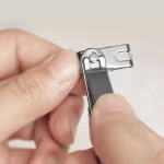 Huohou No Splash Nail Clippers Set with 360° rotating clippers, dot-pattern file, four-ring ear pick, and metal storage case – perfect for travel and hygiene