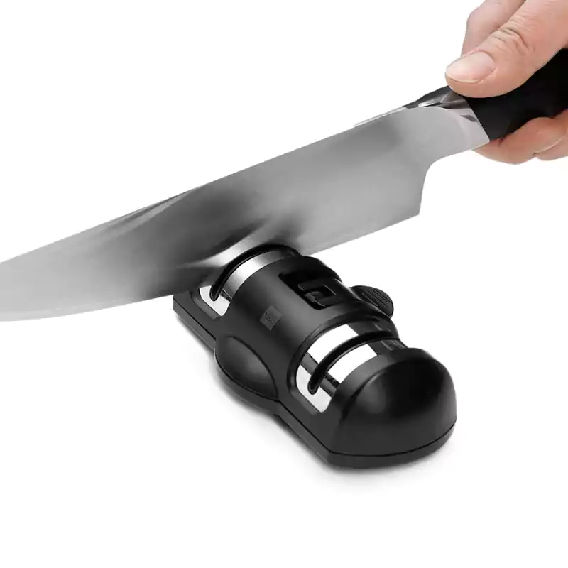 Xiaomi Huohou 2-Stage Professional Kitchen Knife Sharpener Key Features: 2-stage knife sharpening system Diamond rough grinding wheel Ceramic fine grinding wheel Double-sided sharpening design Suction-fixing base for stability One-handed operation Stainless steel decoration plate Compact and easy-to-store design Model: HU0045